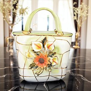 Tasche, Tischdekoration aus Keramik, geschmückt mit Blumen und goldenen Details, handgefertigt.